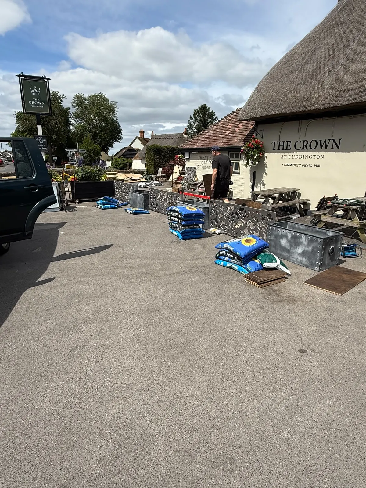 New planters going in out front
