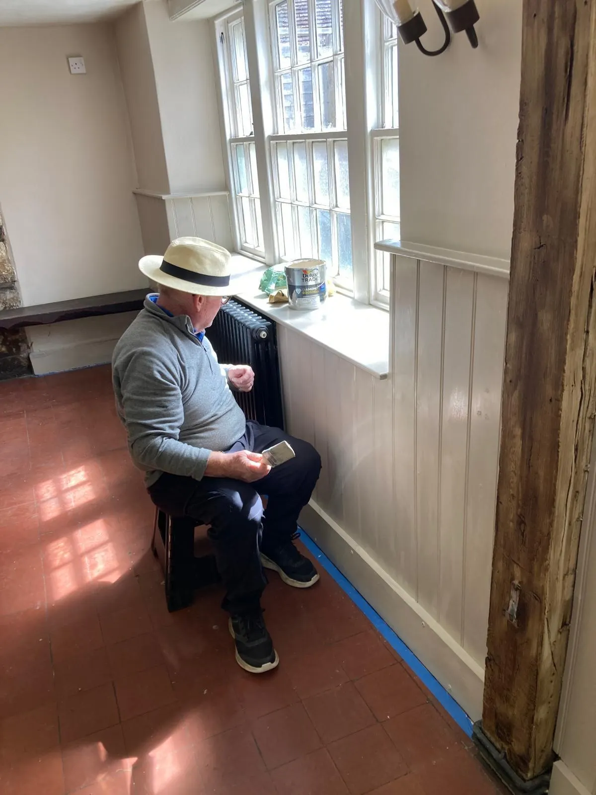 A volunteer, admiring his work